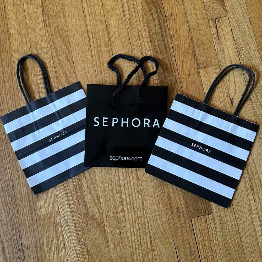 Three mini Sephora shopping bags